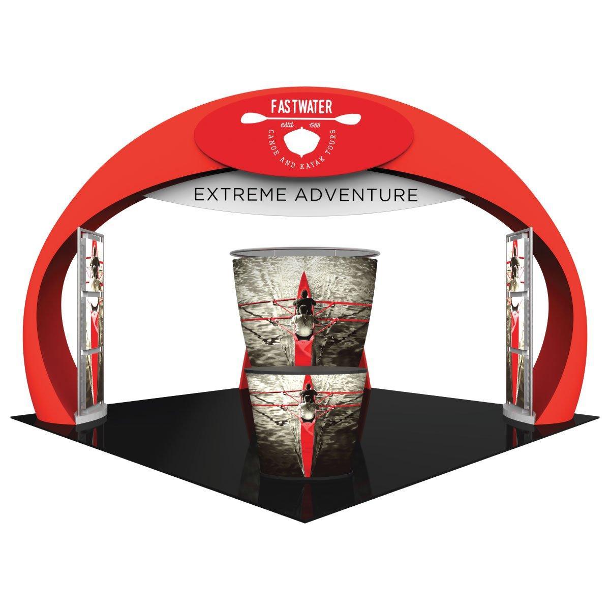 Trade show island booth with curved arch, branded signage, and kayak-themed graphics for extreme adventure events