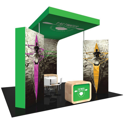 Modern trade show island booth with branded graphics and a seating area for exhibitions and special events