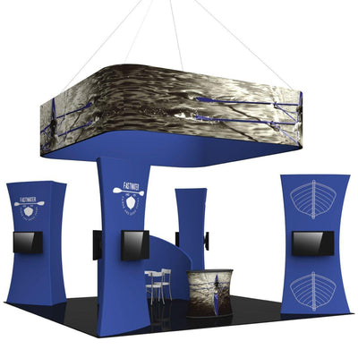 Trade show island display kit with curved towers, hanging graphic, monitors, and branded counters for exhibitions