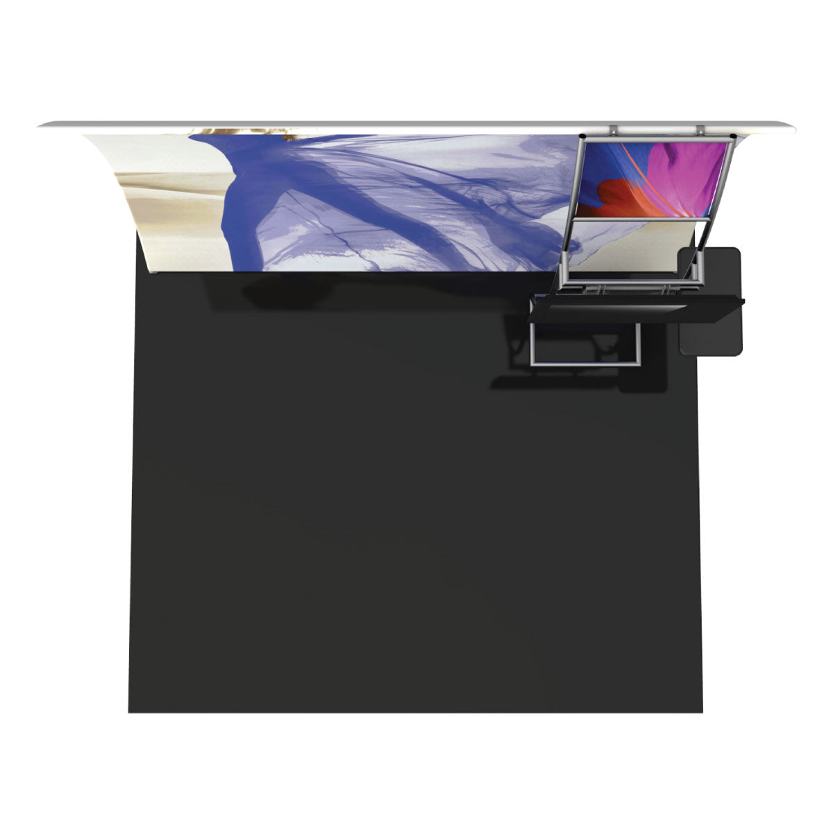 Vertical curved trade show display with overhead graphics and a workstation desk on black flooring