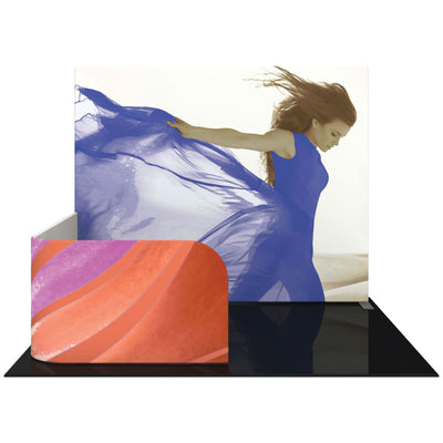 Trade show backwall and counter display featuring large graphic of woman with flowing fabric for exhibitions and events