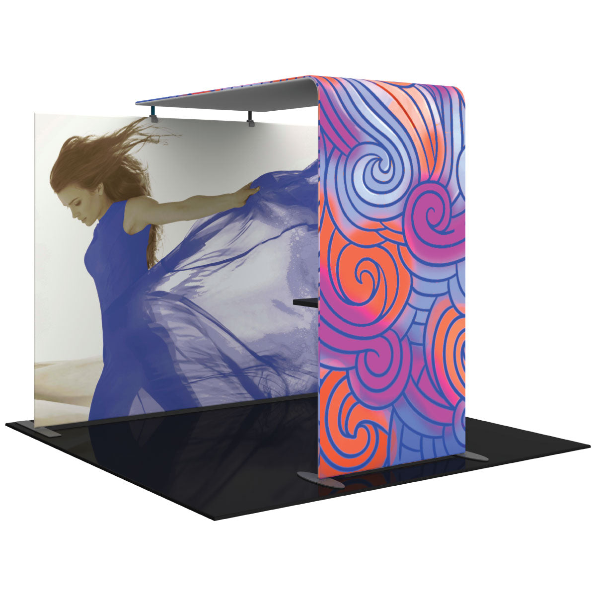 Trade show booth with large fabric graphics featuring dynamic woman and abstract swirls for exhibitions