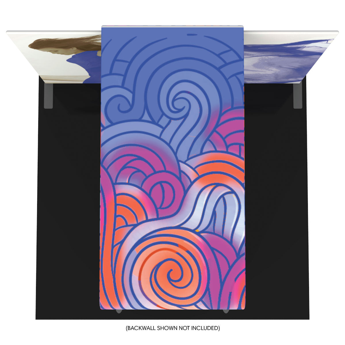 Trade show booth with colorful abstract swirl graphics on fabric display for exhibitions and events