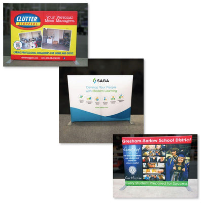 Three tabletop trade show displays showcasing business branding and messaging for exhibitions and events