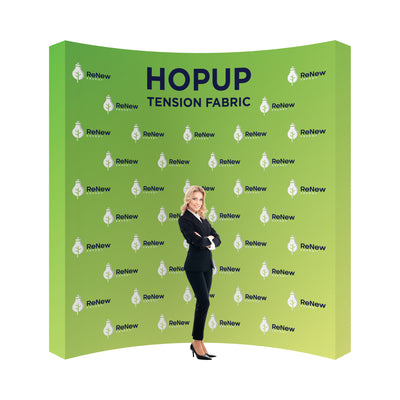 Trade show tension fabric display featuring branded graphics and a professional woman for exhibitions