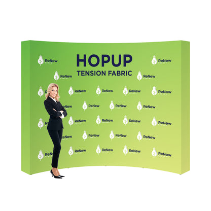 Curved tension fabric trade show display with ReNew Energy branding and businesswoman