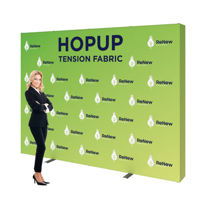 Trade show tension fabric backdrop display with ReNew Energy branding and businesswoman for exhibitions