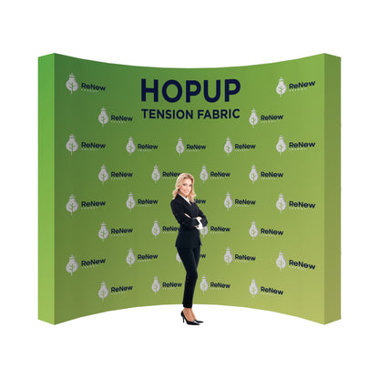 Trade show tension fabric display stand featuring curved backdrop with branded graphics and professional presenter
