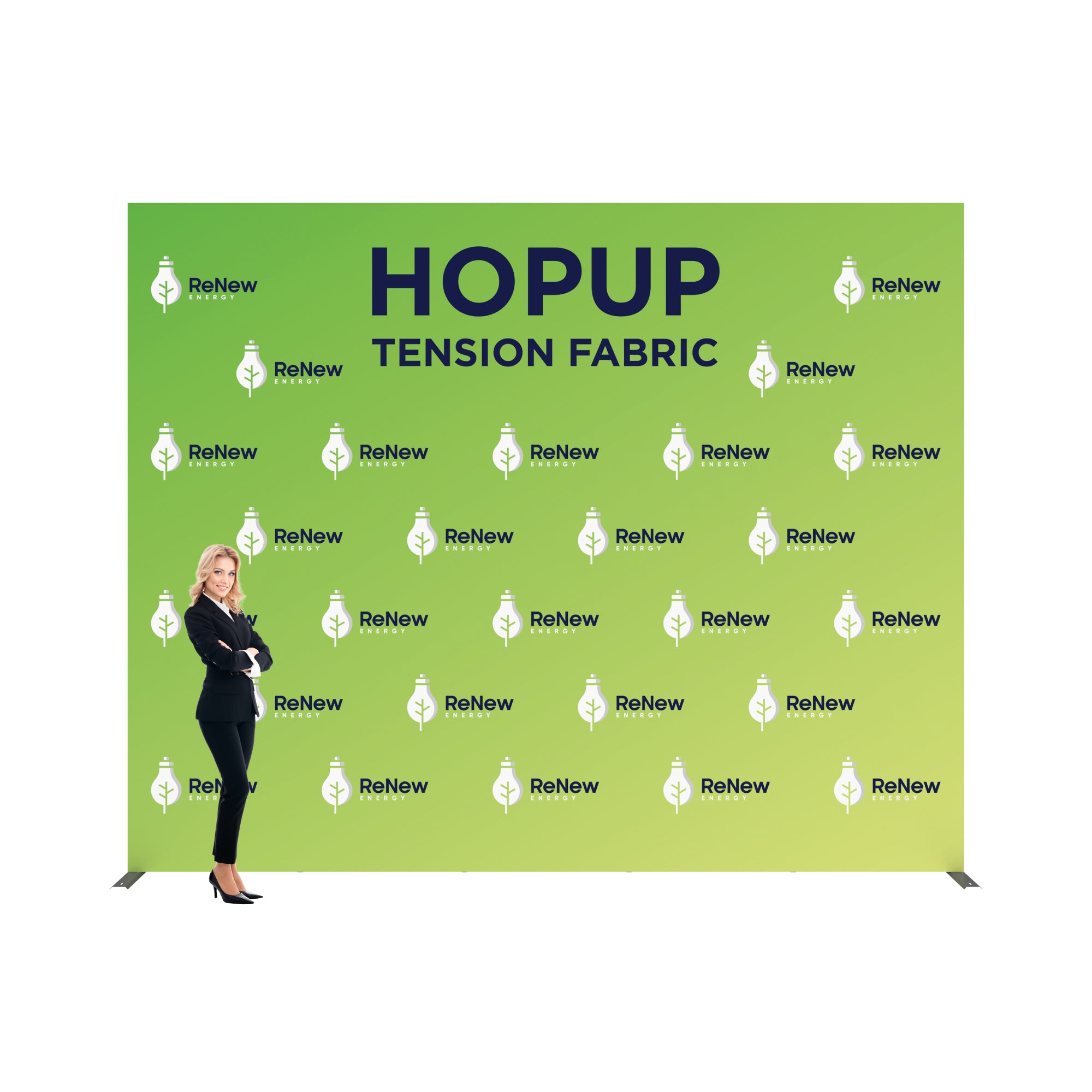 Large trade show tension fabric backdrop with renewable energy branding and a woman standing beside it