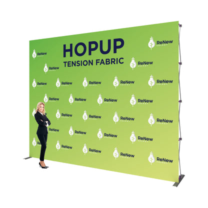 Large hopup tension fabric backdrop with ReNew Energy branding at trade show or exhibition booth