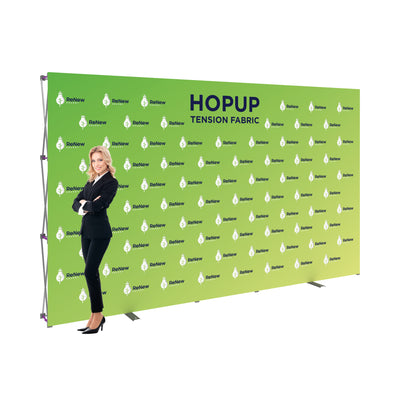 Trade show tension fabric backdrop with ReNew Energy logo and businesswoman for exhibitions and events