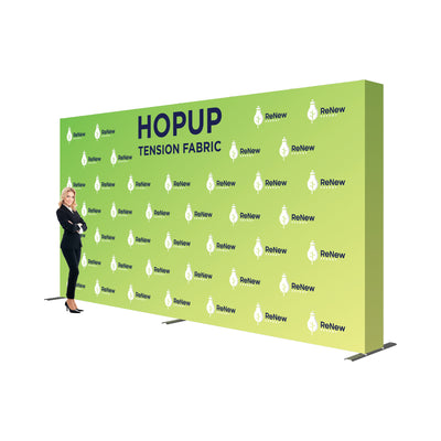 Large tension fabric backdrop display with branded graphics for trade shows and exhibitions
