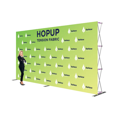 Trade show tension fabric backdrop display with branded graphics and businesswoman for exhibitions
