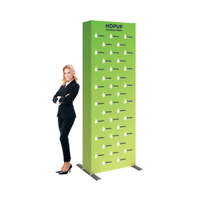 Trade show tension fabric display stand with company branding and businesswoman in professional attire