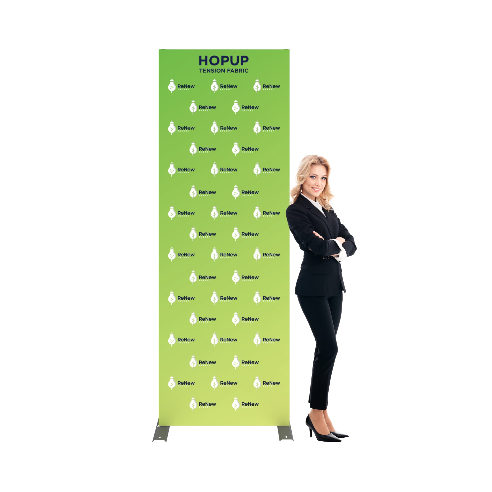 Tension fabric trade show display with renewable energy branding, businesswoman standing beside it