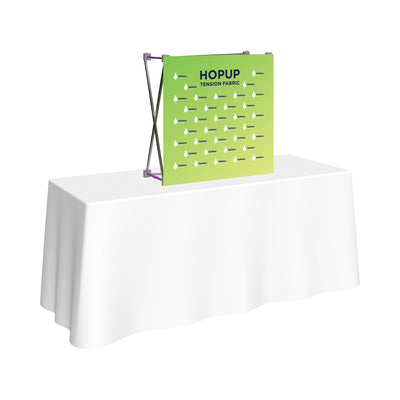 Popup tension fabric display on table for trade shows and exhibitions