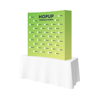 Hopup tension fabric display on table for trade shows and exhibitions branding