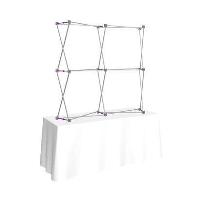 Pop-up display frame set up on a table for trade shows and special event exhibitions