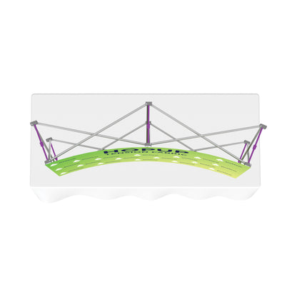 Adjustable curved trade show banner frame mounted on a table for exhibition displays