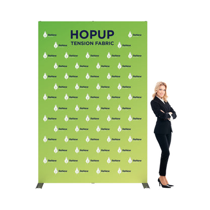 Hopup tension fabric display stand with branded graphics for trade shows and exhibitions, with a businesswoman