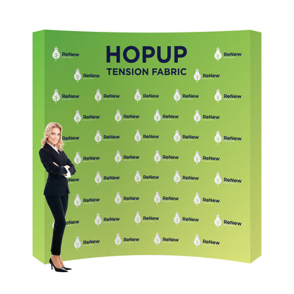 Trade show tension fabric backdrop display with branded ReNew Energy graphics and professional woman