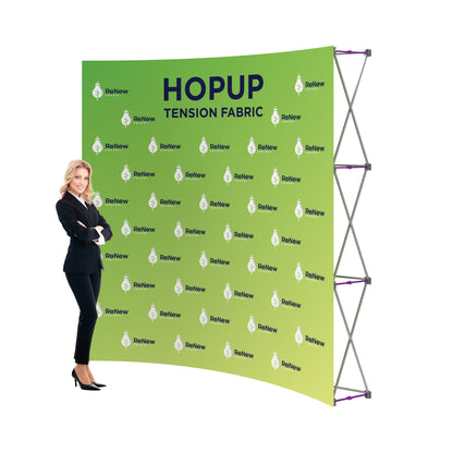 Trade show tension fabric display with branded backdrop and businesswoman for exhibitions and events