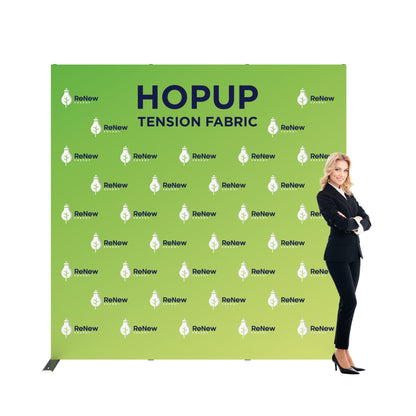 Trade show tension fabric backdrop with corporate branding and businesswoman for exhibitions and events