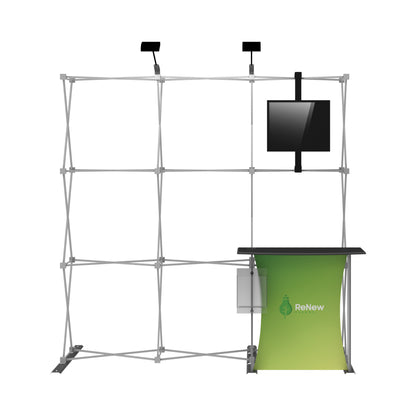 Trade show display frame with monitor mount, overhead lights, and branded counter for exhibitions