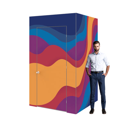 Modular enclosed booth with colorful wave pattern next to man, ideal for trade shows and events
