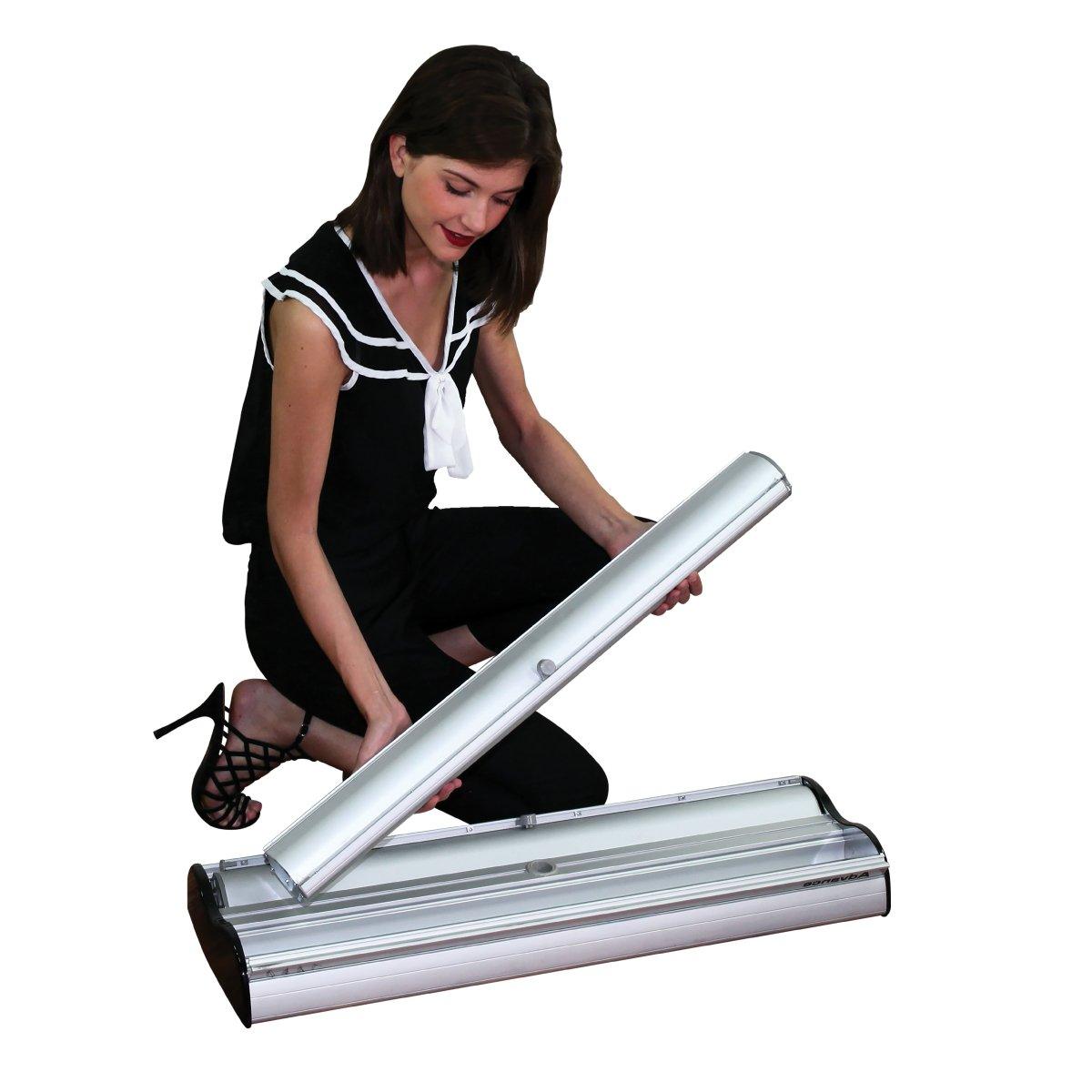 Woman assembling banner stand cassette for trade shows, exhibitions, and special events