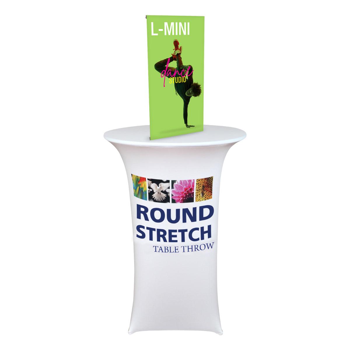 Mini tabletop banner stand on round stretch table throw for trade shows and exhibitions
