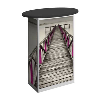 Oval trade show counter with wraparound graphic of wooden pier extending over water, ideal for exhibitions