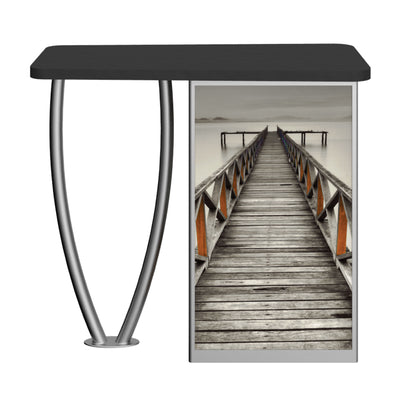 Trade show counter with promotional graphic of a wooden pier extending into calm water for exhibition use