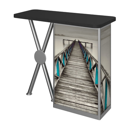 Trade show counter with graphic panel featuring wooden pier image for exhibitions and events