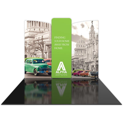 Curved trade show display with classic cars and urban architecture graphics and real estate branding