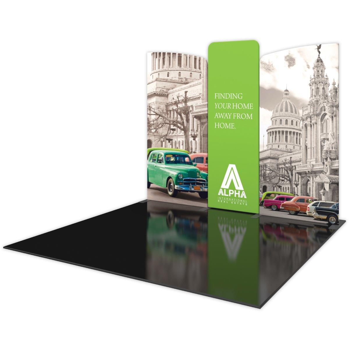 Trade show display kit featuring curved graphic panels with vintage cityscape and real estate branding