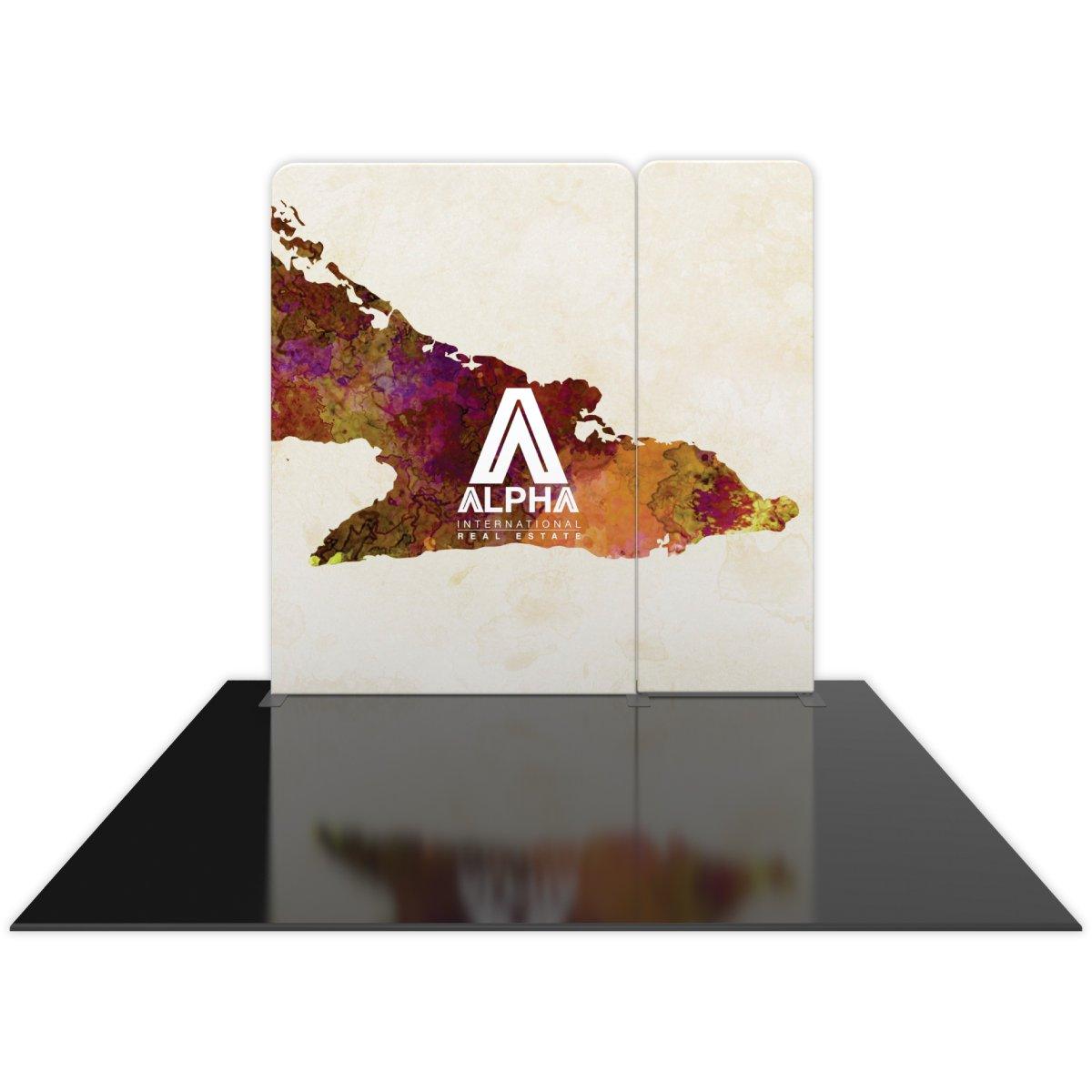 Trade show display with custom backdrop featuring Alpha International Real Estate branding and abstract map graphics