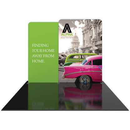 Trade show display featuring real estate branding and vintage cars with cityscape for exhibitions and events