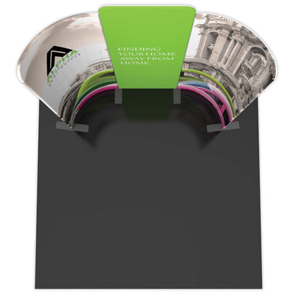 Curved 10ft trade show display with central panel and side wings featuring architectural and travel graphics