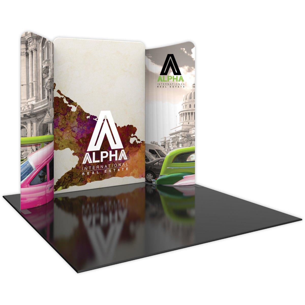 Curved modular trade show display with Alpha International Real Estate branding and architectural graphics