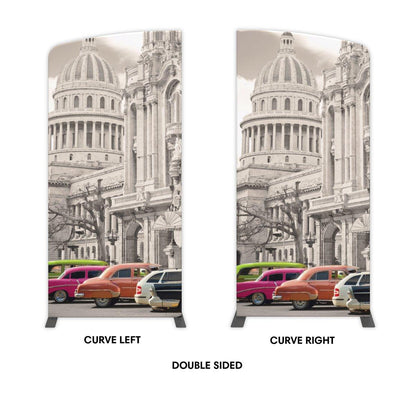 Double-sided curved trade show displays featuring vintage cars and historic building for exhibitions and events
