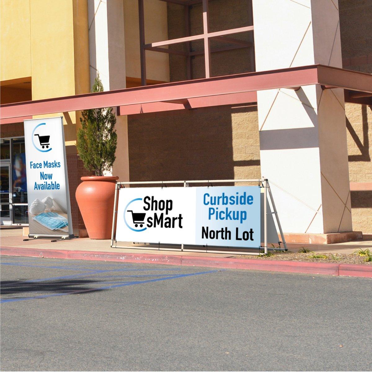 Outdoor banner stand and trade show sign for curbside pickup and face mask availability at event entrance