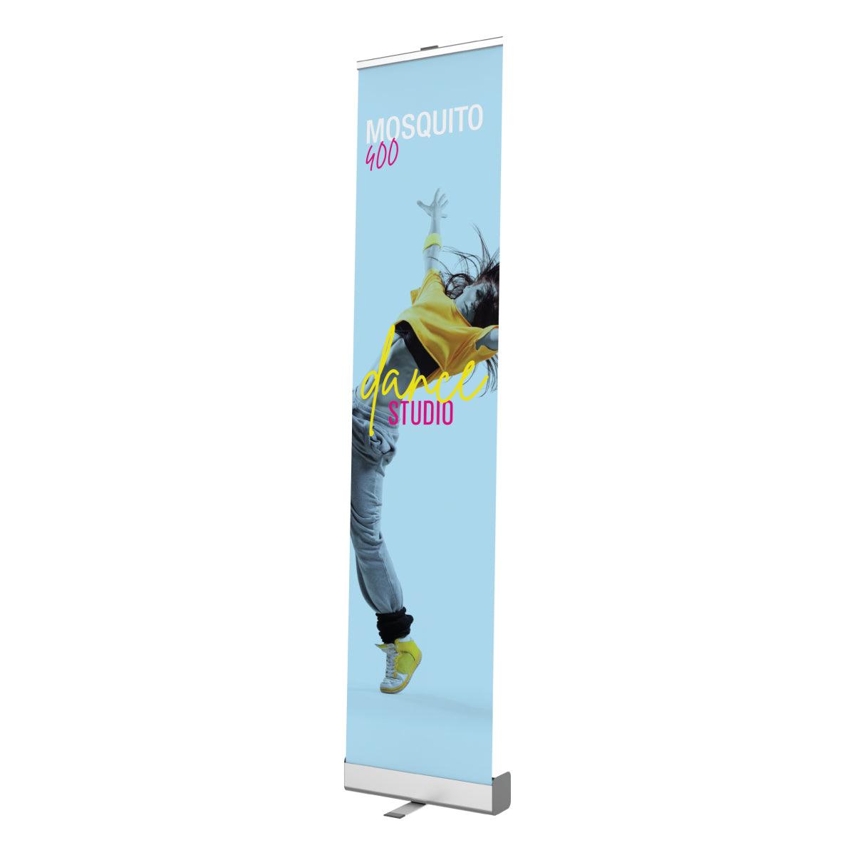 Tall banner stand showcasing dance studio advertisement with dynamic dancer image for trade shows