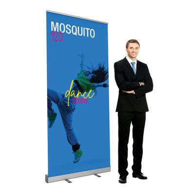 Retractable banner stand displaying dance studio advertisement with man in suit for trade shows and events