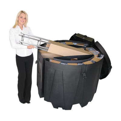 Woman unpacking modular trade show display case with protective foam inserts for exhibitions and events