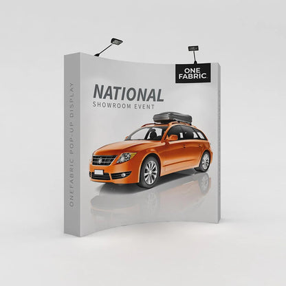 Curved fabric pop-up display with car graphic for trade shows and showroom events