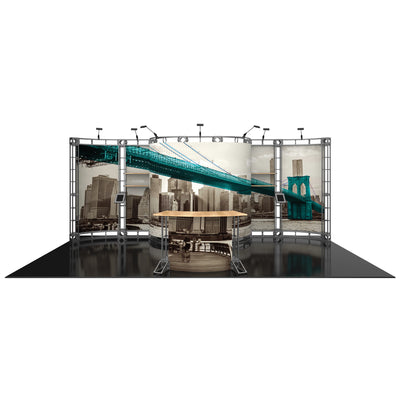Trade show display with modular truss system, large urban cityscape graphics, and information counters