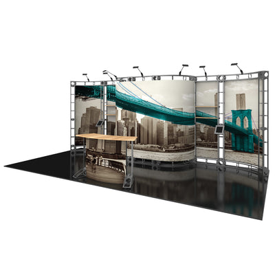 Modular trade show exhibition booth with curved truss system and cityscape graphic panels