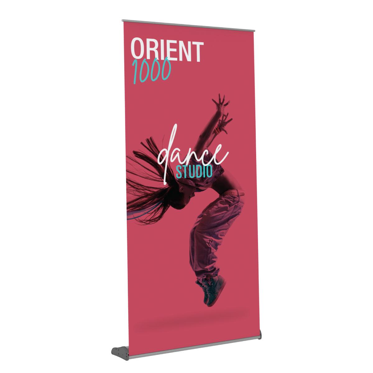 Retractable banner stand displaying dynamic dance studio advertisement for trade shows and exhibitions