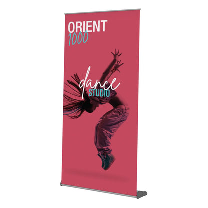 Orient 1000 retractable banner stand displaying dance studio advertisement for trade shows and exhibitions